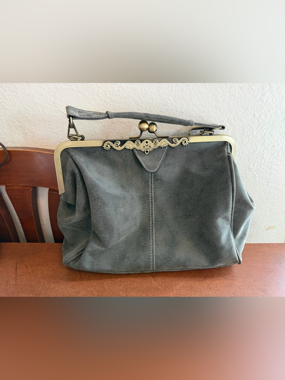 Vintage-Inspired Gray Suede Frame Satchel with Decorative Clip